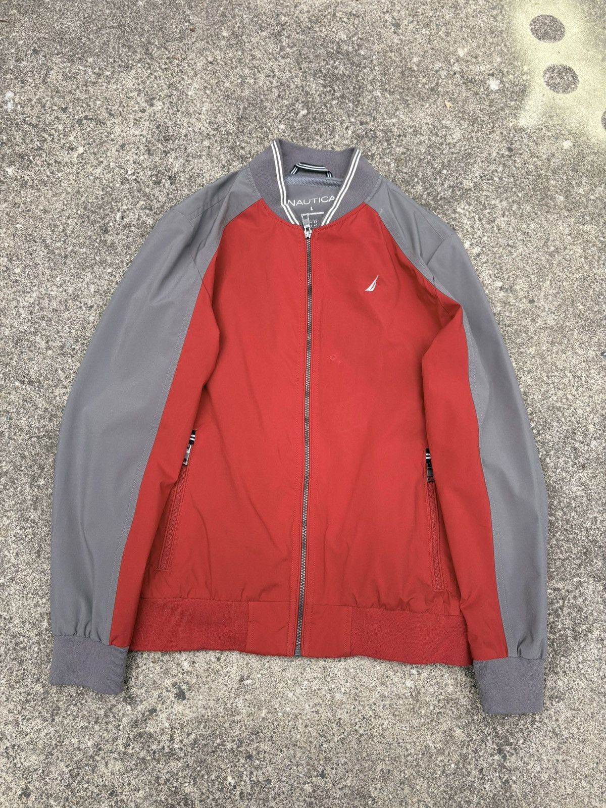 Nautica Nautica full-zip bomber in a red and grey colorblock build. Size US L / EU 52-54 / 3 - 1 Thumbnail