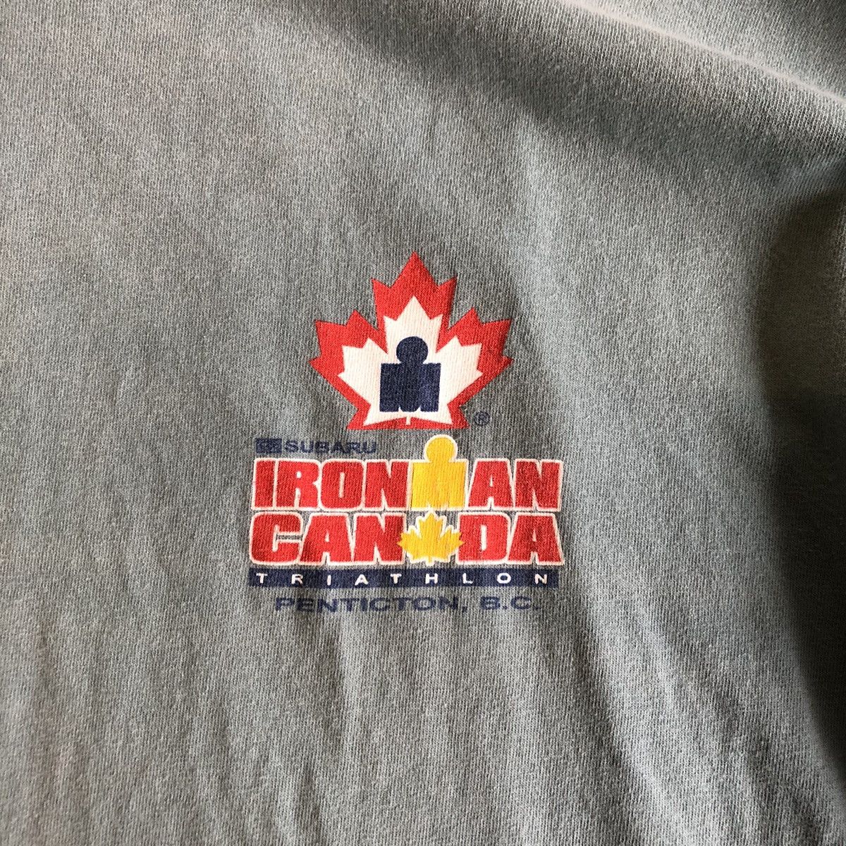Vintage 1999-2005 Gildan Subaru Iron Man Canada Triathlon t-shirt Size US L / EU 52-54 / 3 - 4 Thumbnail