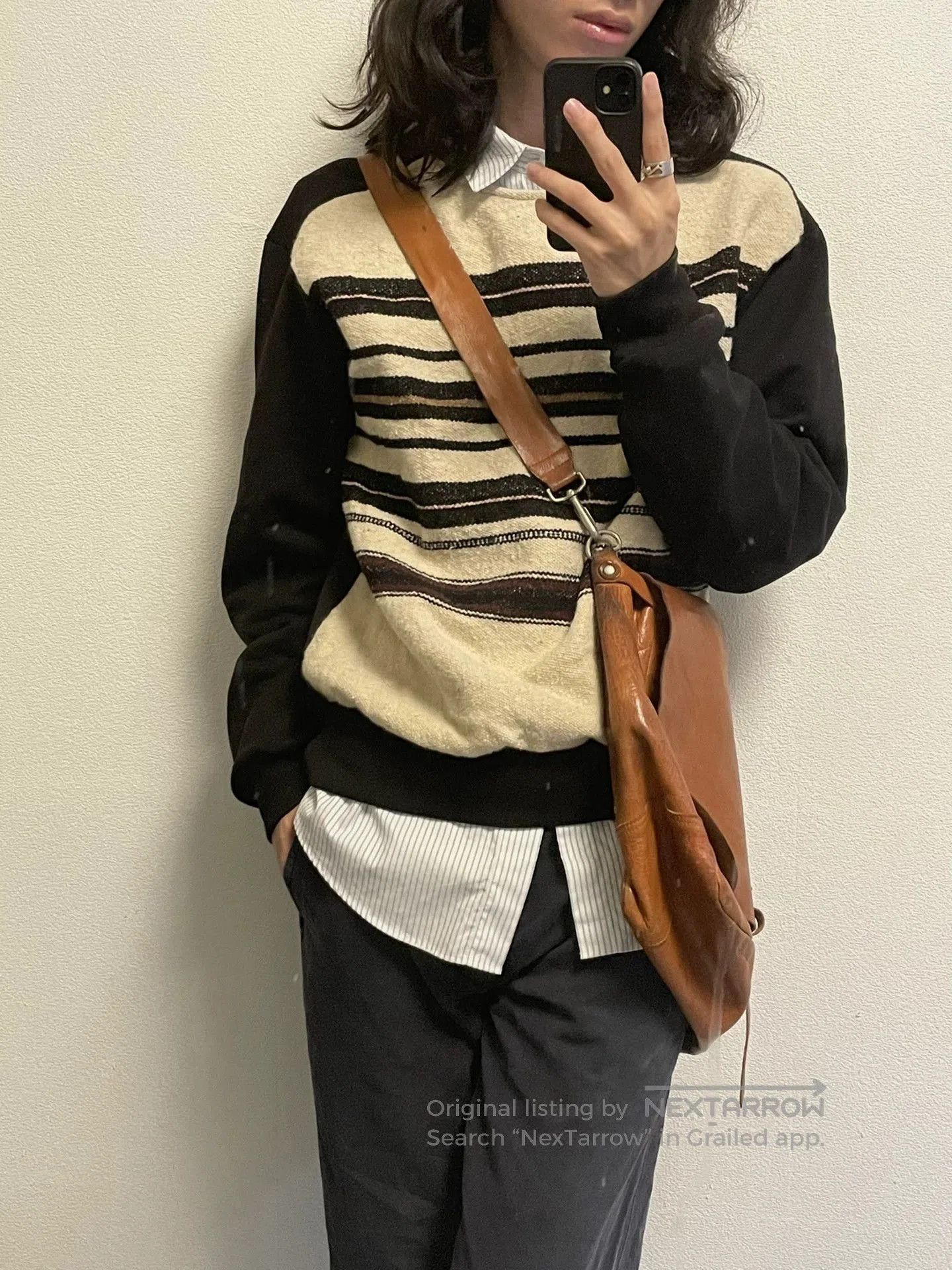 drapes with fine knit texture and stripes.