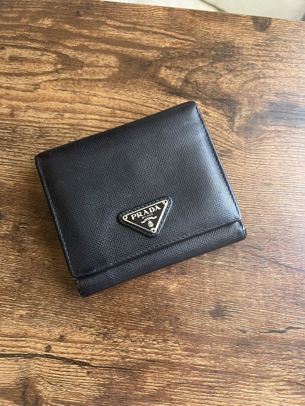 image of Prada Leather Tri-Fold Wallet in Black, Men's