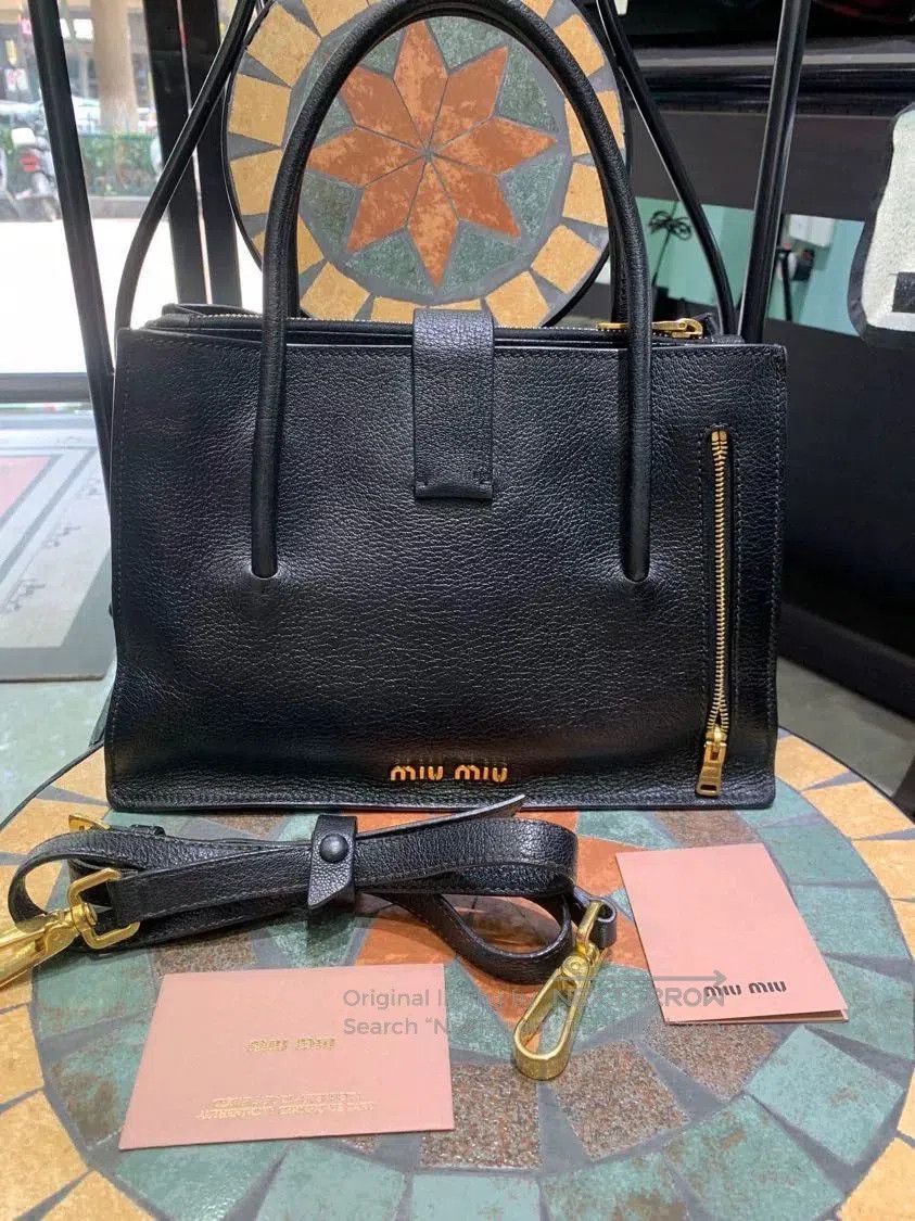 Miu Miu Miu Miu Classic Black Leather Accordion Bag. Size ONE SIZE - 1 Thumbnail