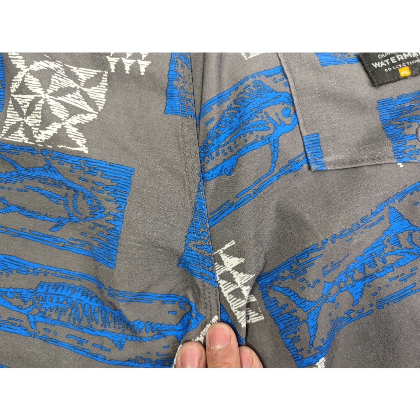 Quiksilver Quiksilver Waterman Hopu Aina Men’s Medium Swim Trunks Lined Drawstring Pockets Blue Trunks Beach Hawaii Aloha Surf Ocean Waves Pattern AOP Size ONE SIZE - 4 Thumbnail