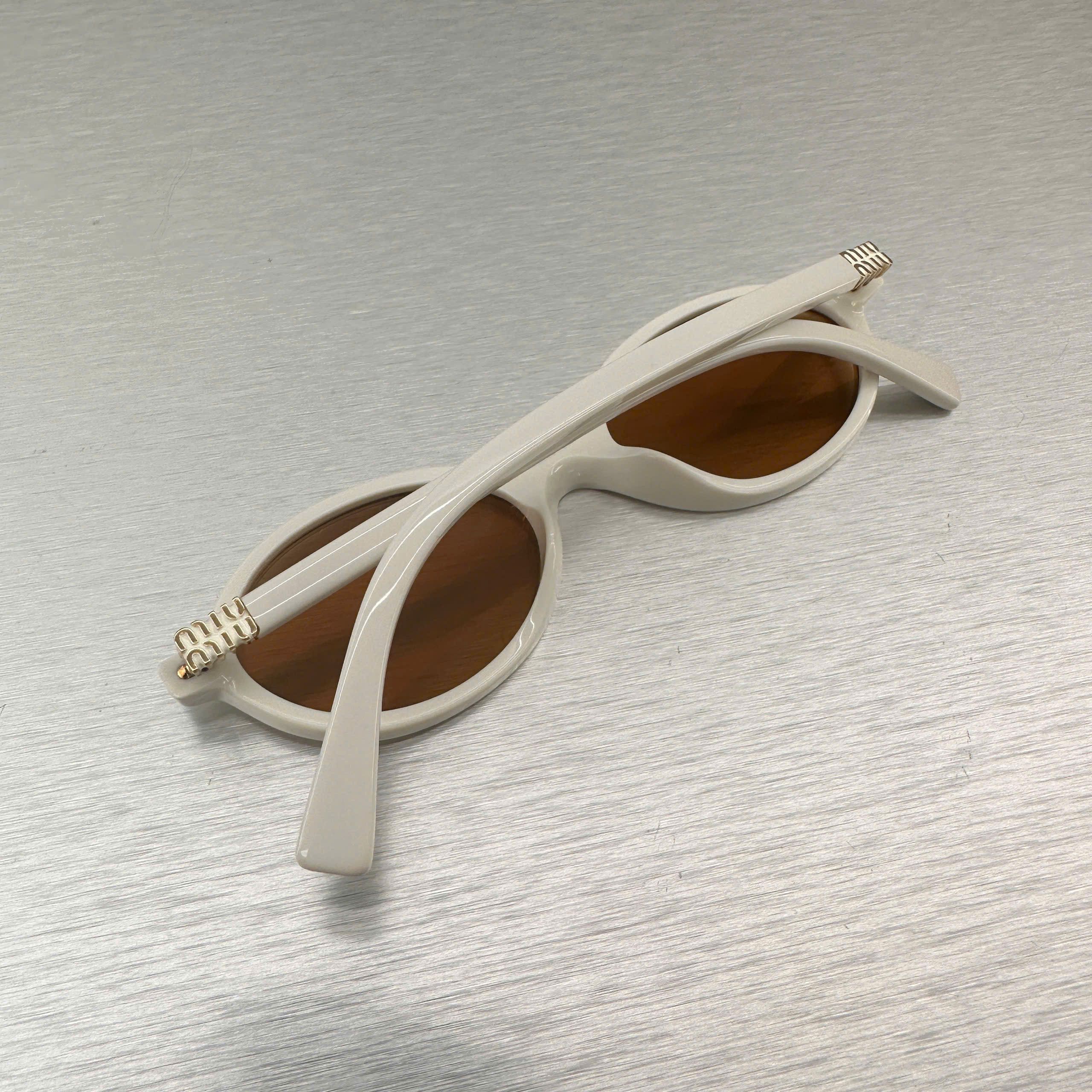 Miu Miu MIU MIU MU 04ZS 14240D Eyewear WHITE Size ONE SIZE - 2 Thumbnail