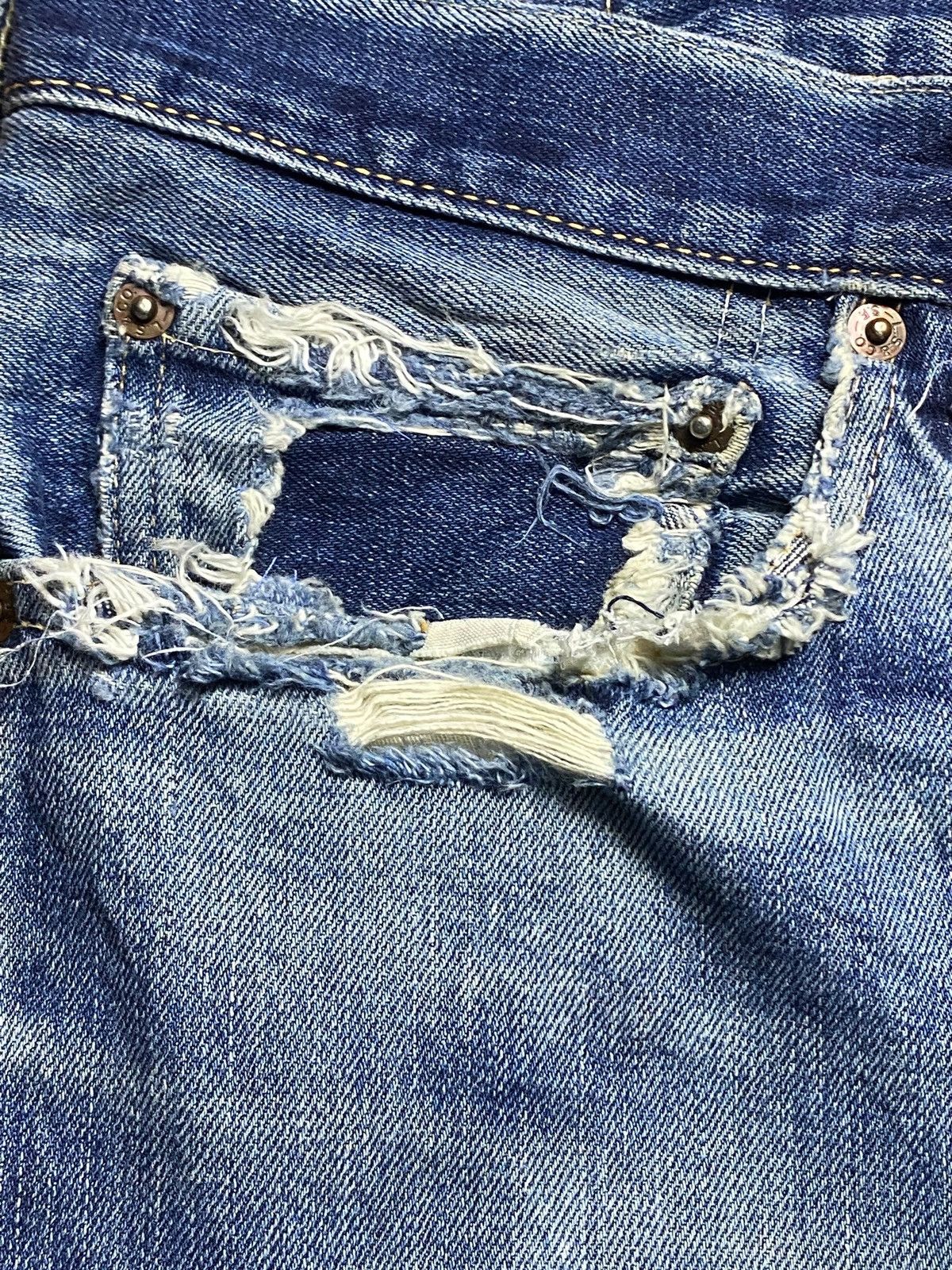 Vintage Levis 502 Blue Wash Ripped Straight Jeans