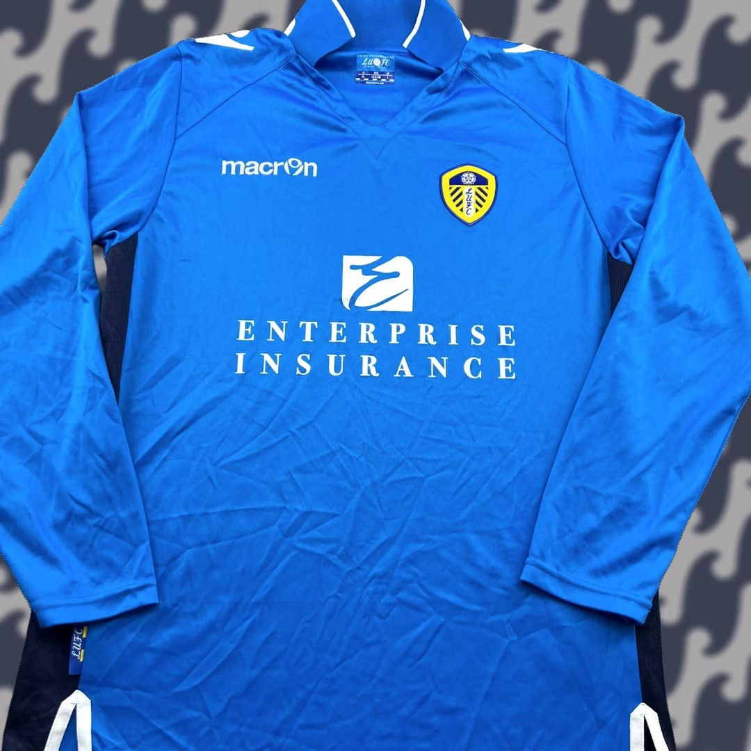 Macron Leeds United Macron Away Mens Football Jersey XL Long Sleeve Blue 100% Polyester Moistu re Wicking Quick Dry Jersey Vintage Size US XL / EU 56 / 4 - 1 Thumbnail