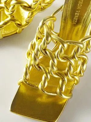 o1bcso1str0924 Stretch Twist Sandal Mules in Gold