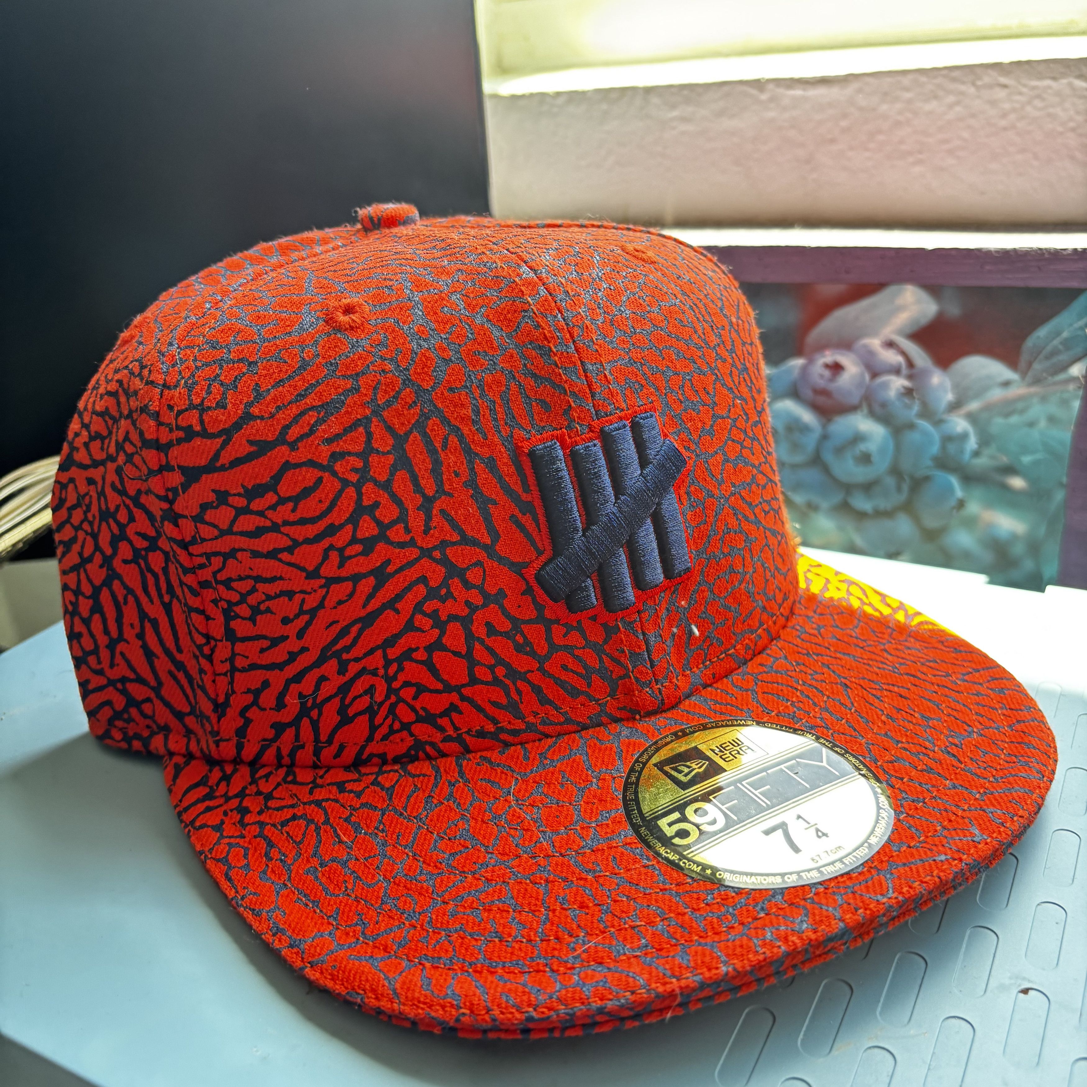 New Era × Undefeated Undefeated 7 1/4 Orange-Navy 59Fifty New Era Fitted Cap Size ONE SIZE - 1 Thumbnail