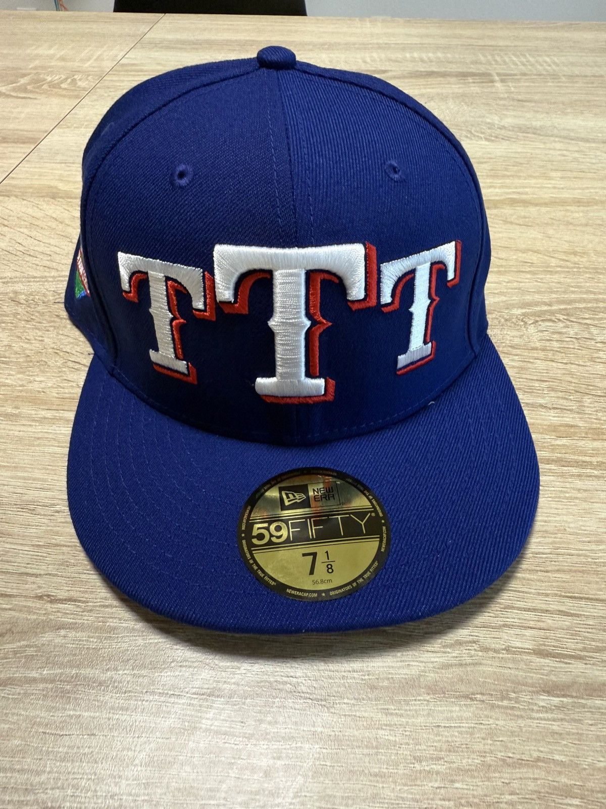 John Geiger John Geiger Misplaced Series Texas Rangers 7 1/8 Size ONE SIZE - 1 Thumbnail