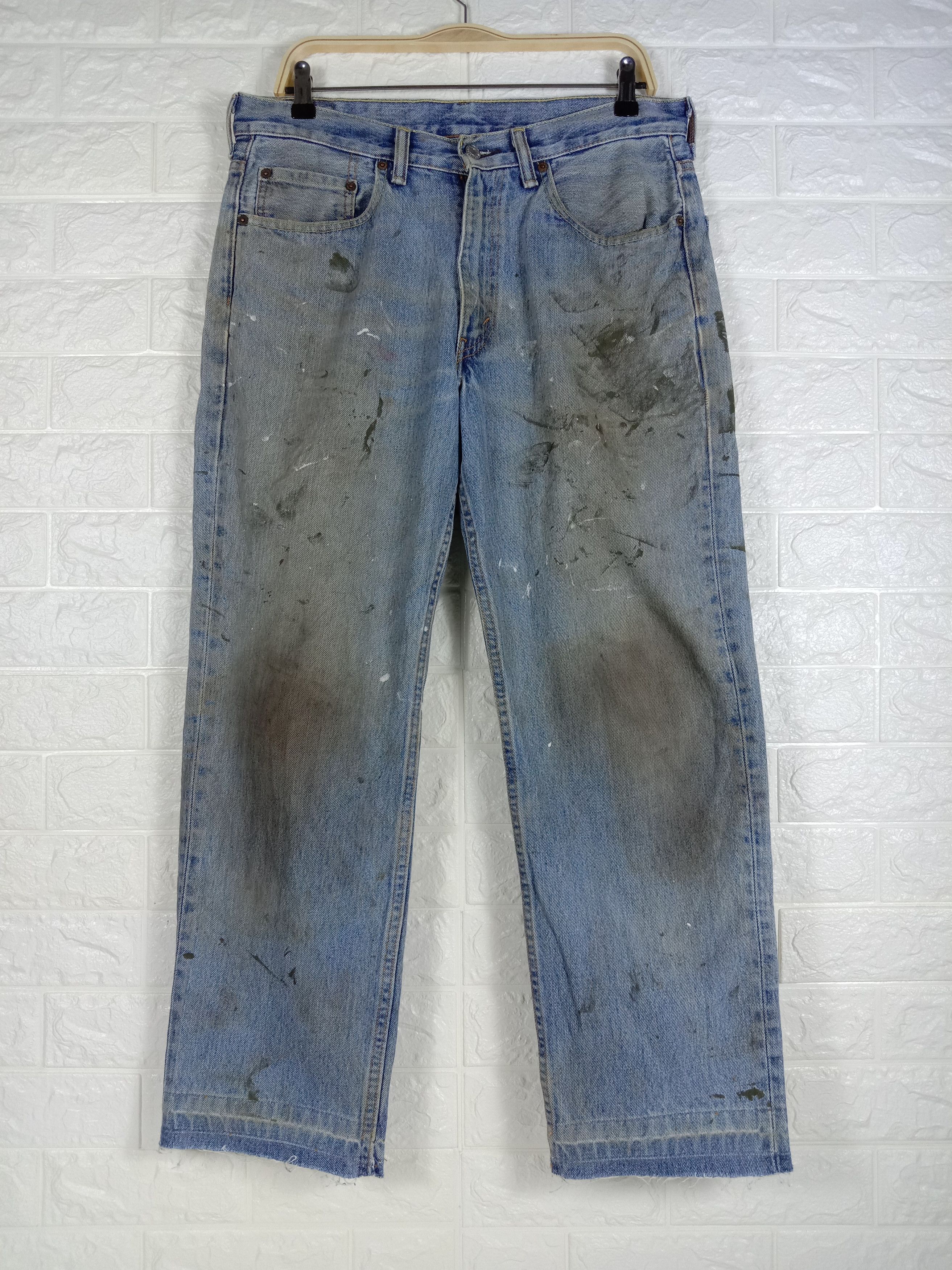 image of Vintage Levi's 550 Jeans Dirty Wash Distressed Denim in Blue, Men's (Size 32)
