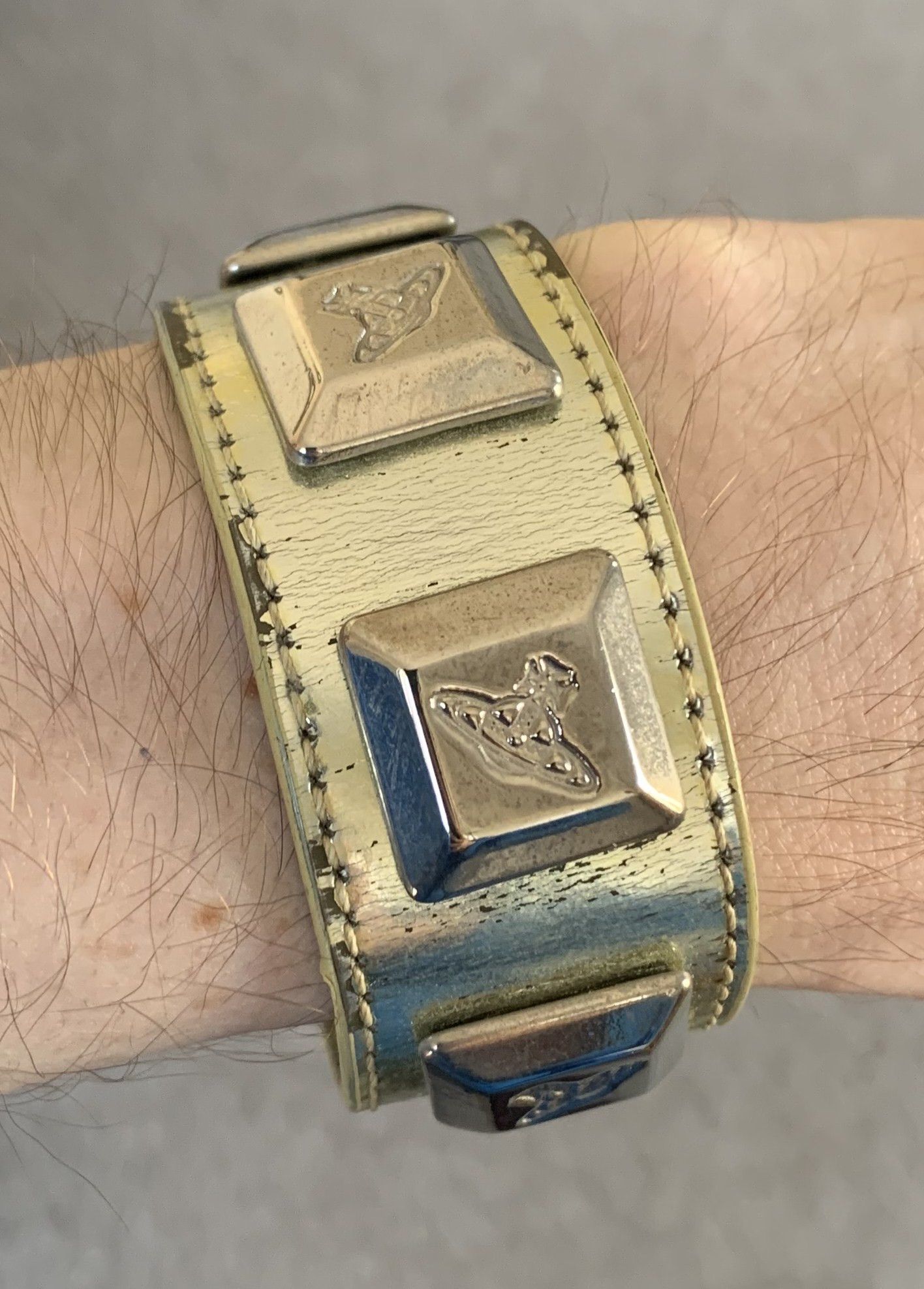 image of Vivienne Westwood Vivenne Westwood Studded Metallic Leather Orb Bracelet in Gold, Men's