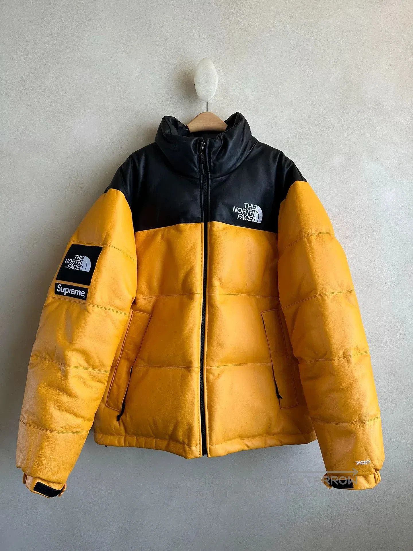 supreme x the north face yellow puffer jacket.