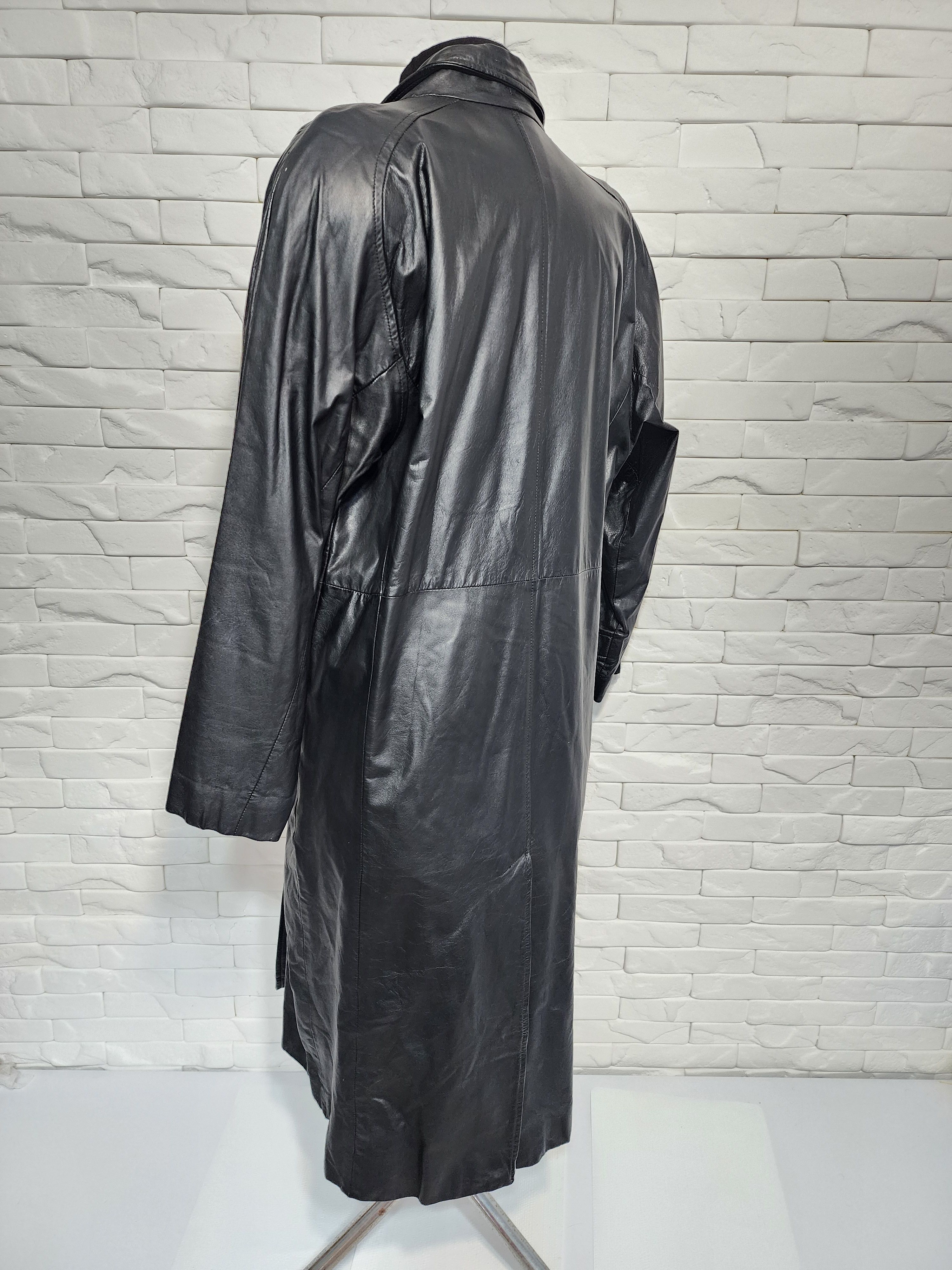 Women black leather raincoat.