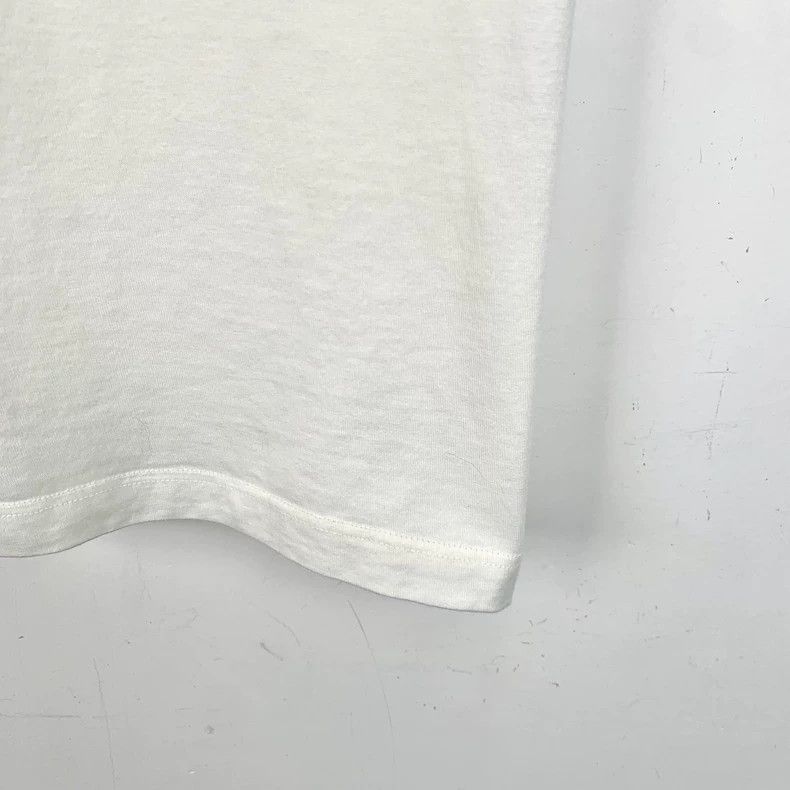 Saint Laurent Paris Saint Laurent White monogrammed cotton crewneck messaging T Size US M / EU 48-50 / 2 - 5 Thumbnail