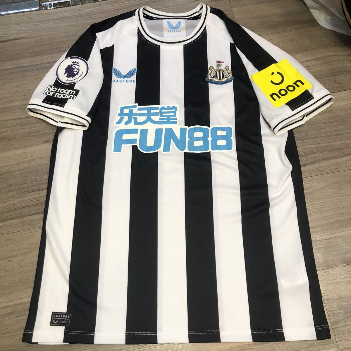 image of Soccer Jersey Newcastle 22/23 Home Shirt 9 Wilson in Black/White, Men's (Size Large)