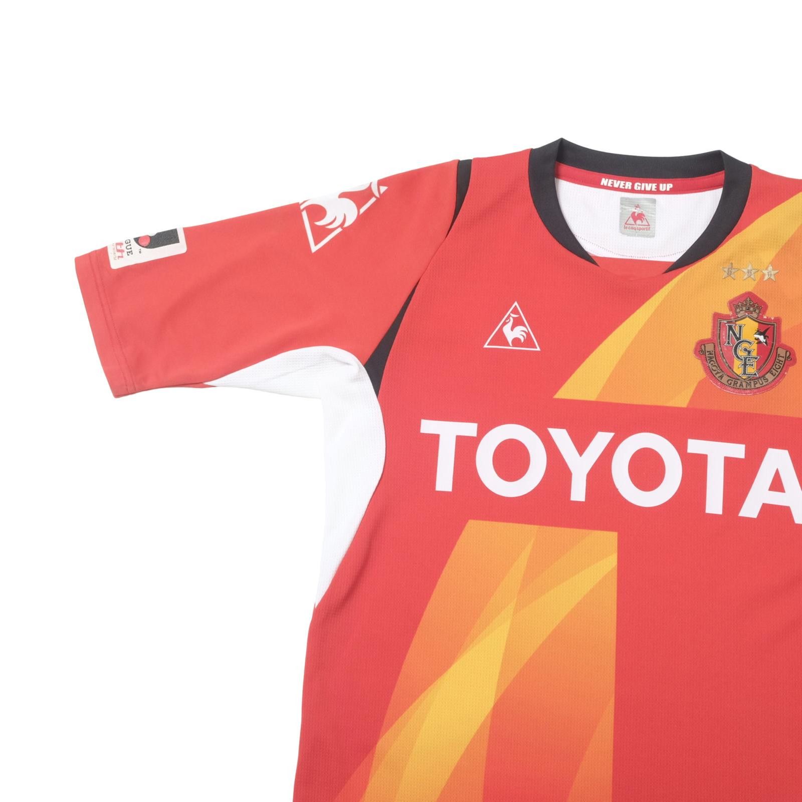 Le Coq Sportif 2014/15 Nagoya Grampus Home Shirt Le Coq Sportif (S/M) Size US M / EU 48-50 / 2 - 3 Thumbnail