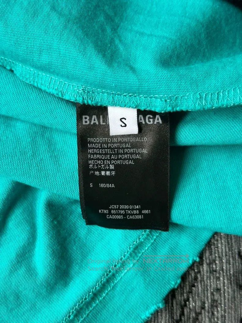 Balenciaga Distressed Logo Short Sleeve T-shirt.