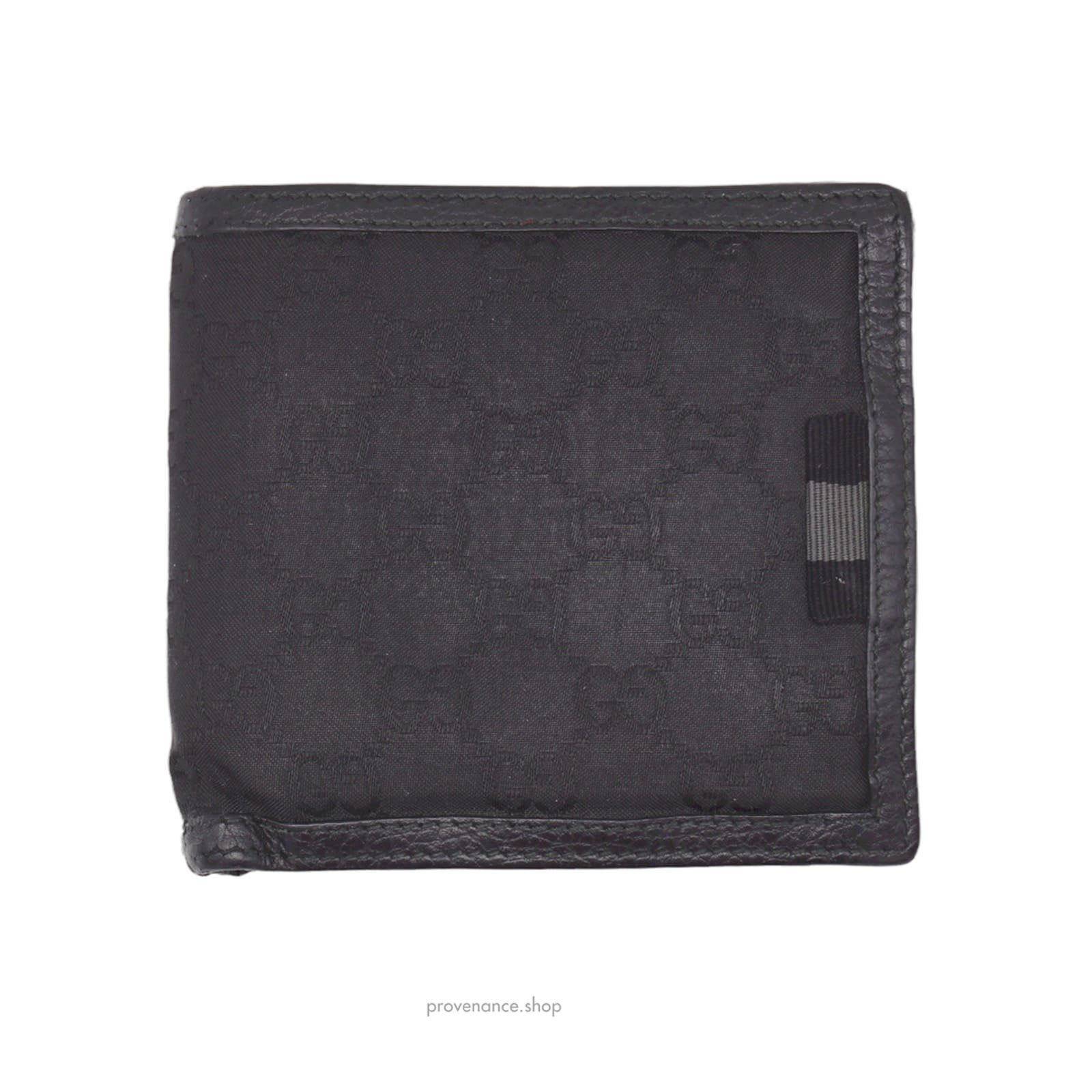 image of Gucci Bifold Wallet - Black GG Canvas With Leather Trim, Men's
