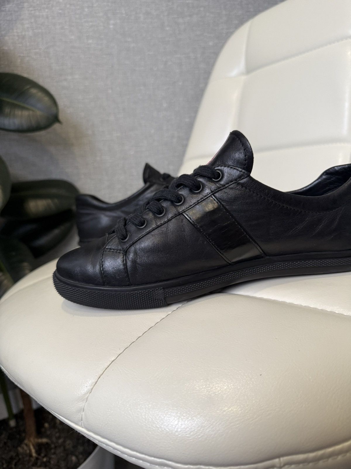 Prada Prada Black Leather Low-Top Sneakers with Red Stripe Logo Size US 7 / IT 37 - 14 Thumbnail