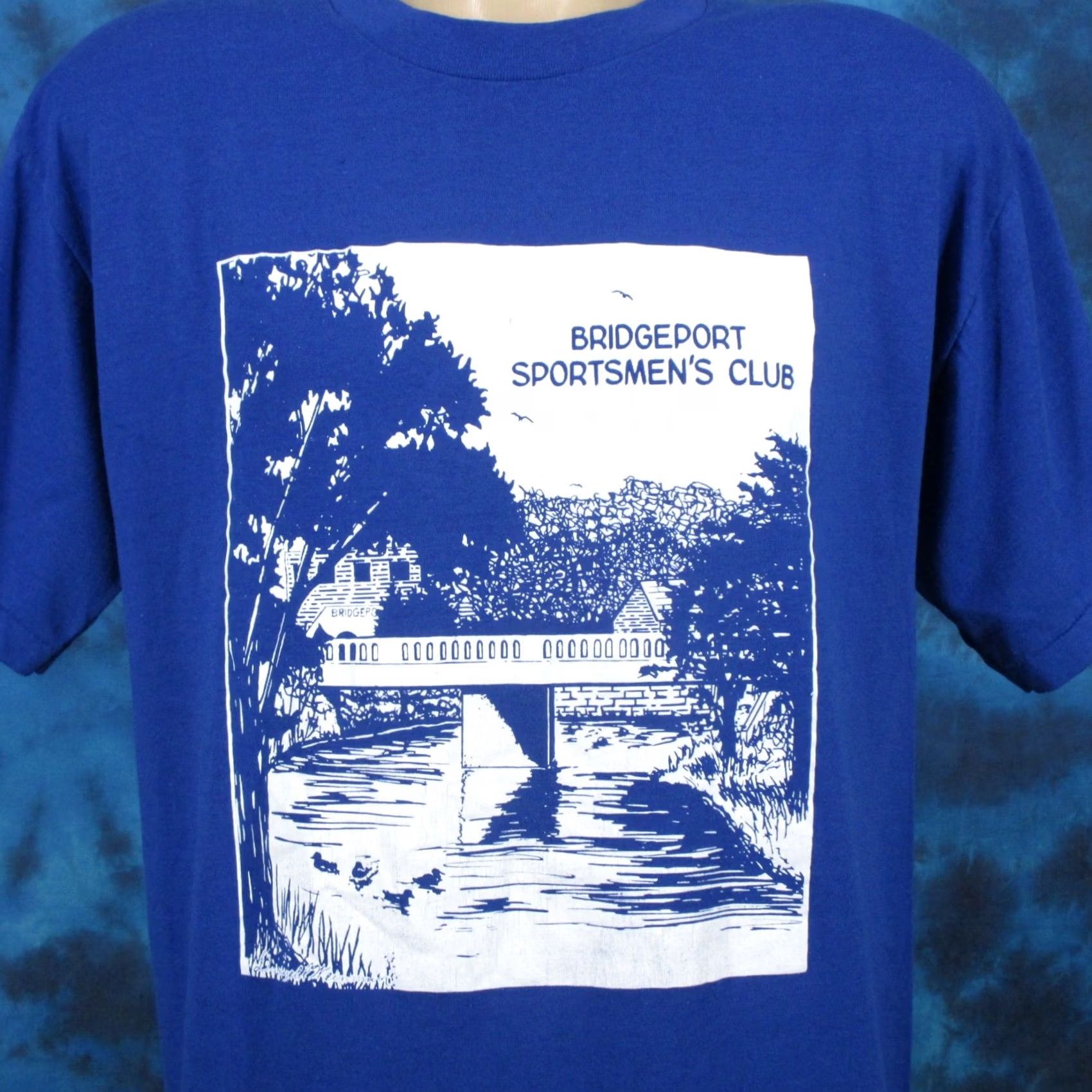Vintage vintage 80s BRIDGEPORT SPORTSMEN’S CLUB BUTTERY SOFT T-Shirt LARGE blue 80s Mens Shirt"} Size US L / EU 52-54 / 3 - 4 Thumbnail