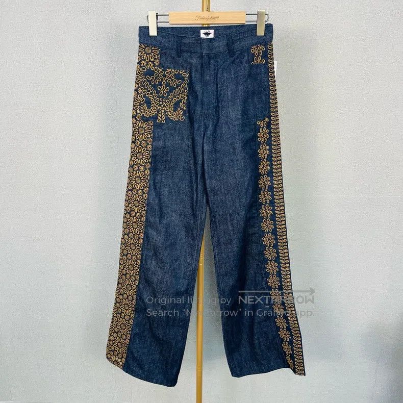 Dior Embroidered hollow pocket jeans