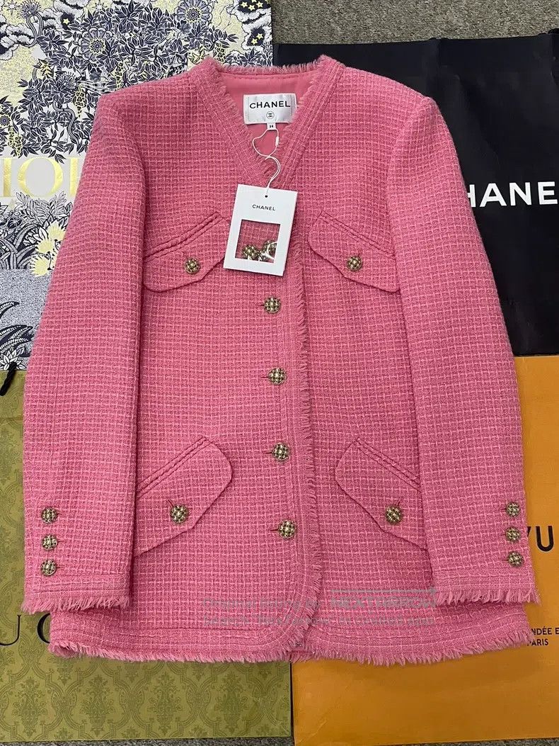 Chanel Pink tweed four-pocket jacket