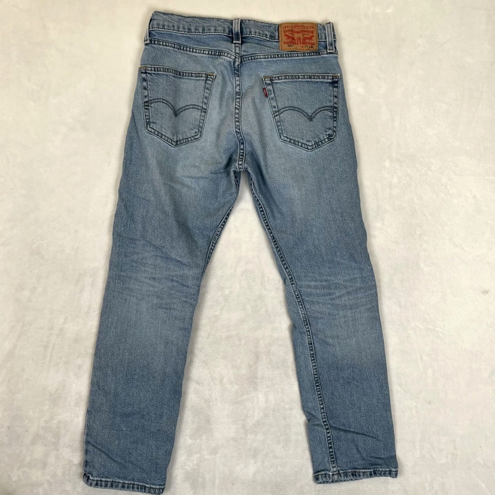 Levi's Levi's 502 Jeans Mens 29x30 Light Wash Blue Regular Taper Denim Stretch Pockets Zip 5-Pocket Size US 29 - 7 Thumbnail