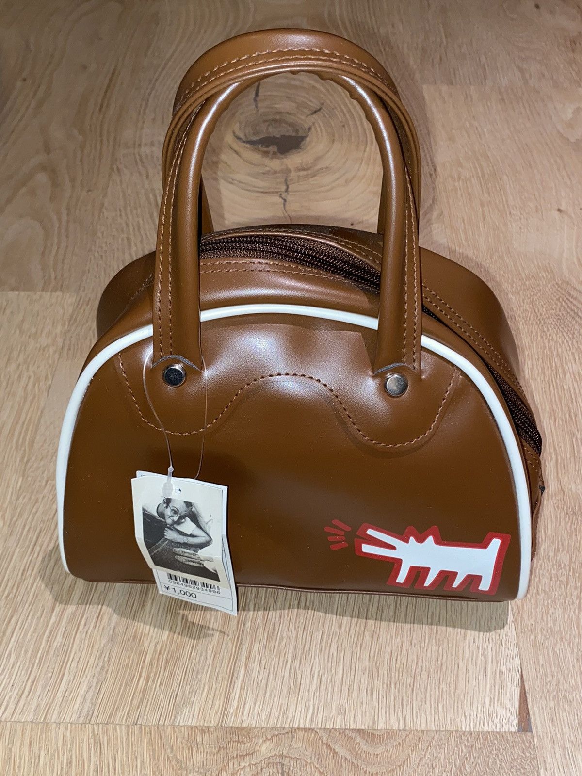 image of Keith Haring Barking Dog Leather Mini Handbag in Brown, Women's