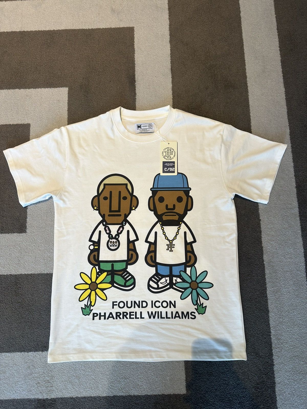 Pharrell williams t shirt best sale