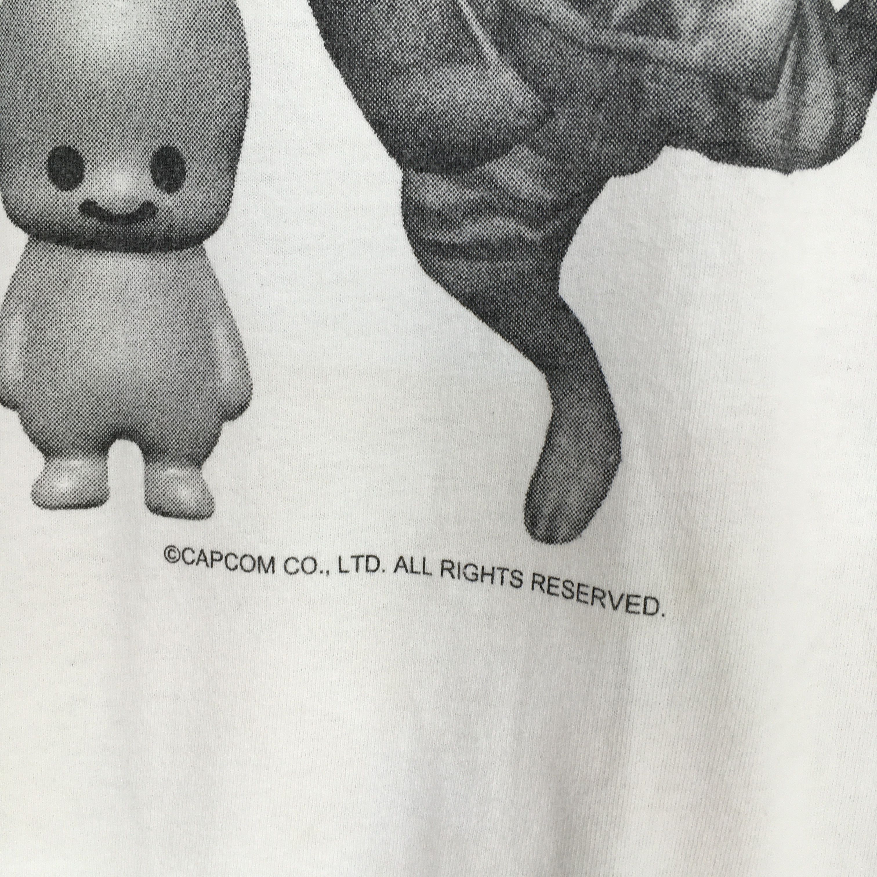 Japanese Brand × Vintage Cune Urcusis The 23rd Anniversary by Capcom Tshirt Size L Size US L / EU 52-54 / 3 - 5 Thumbnail