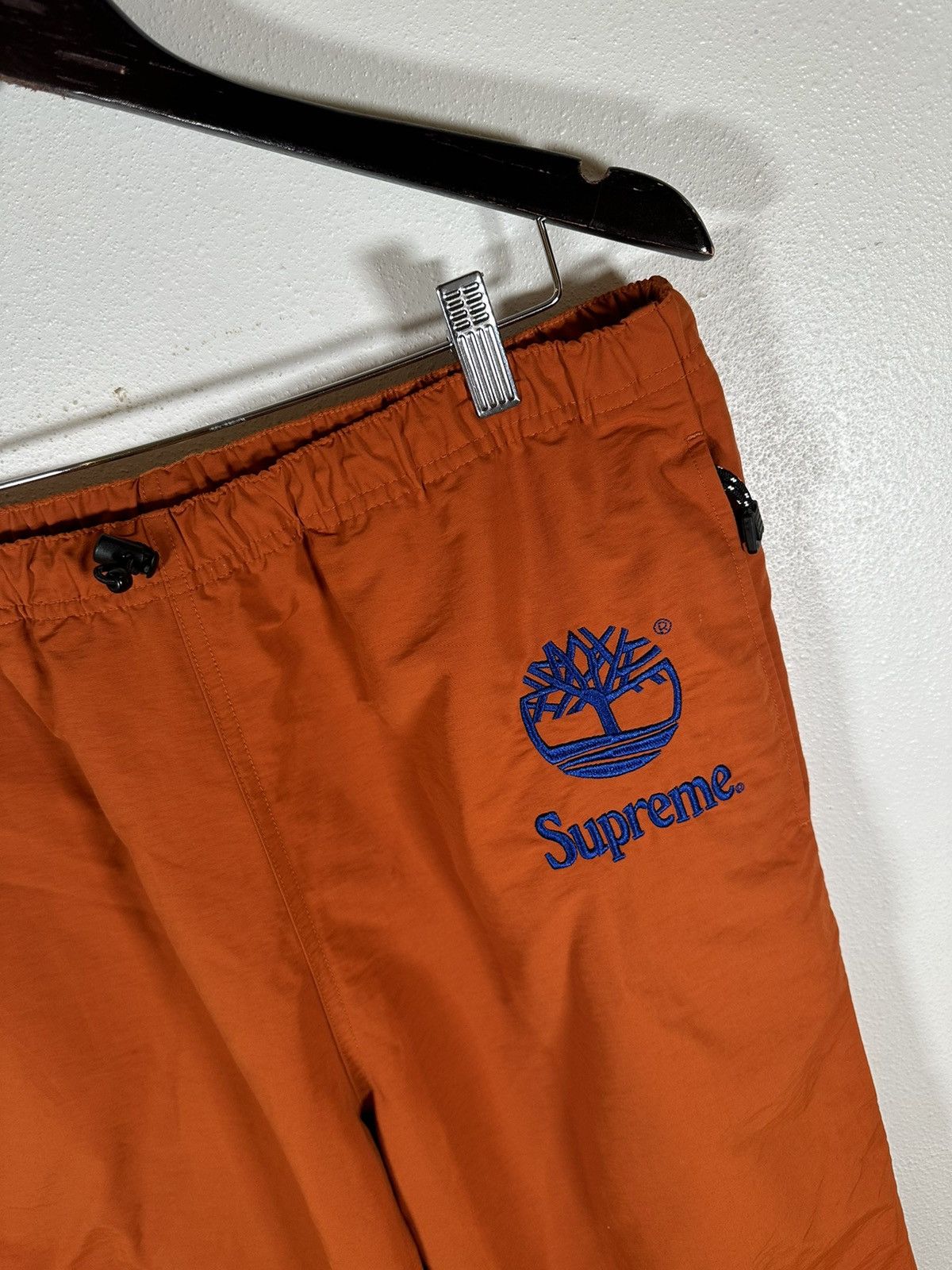 Supreme / Timberland® Track Pant Supreme X Timberland Reflective Taping Track Pant 'Rust