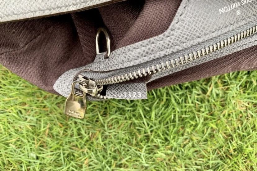 Authentic Louis Vuitton Taiga Messenger Bag