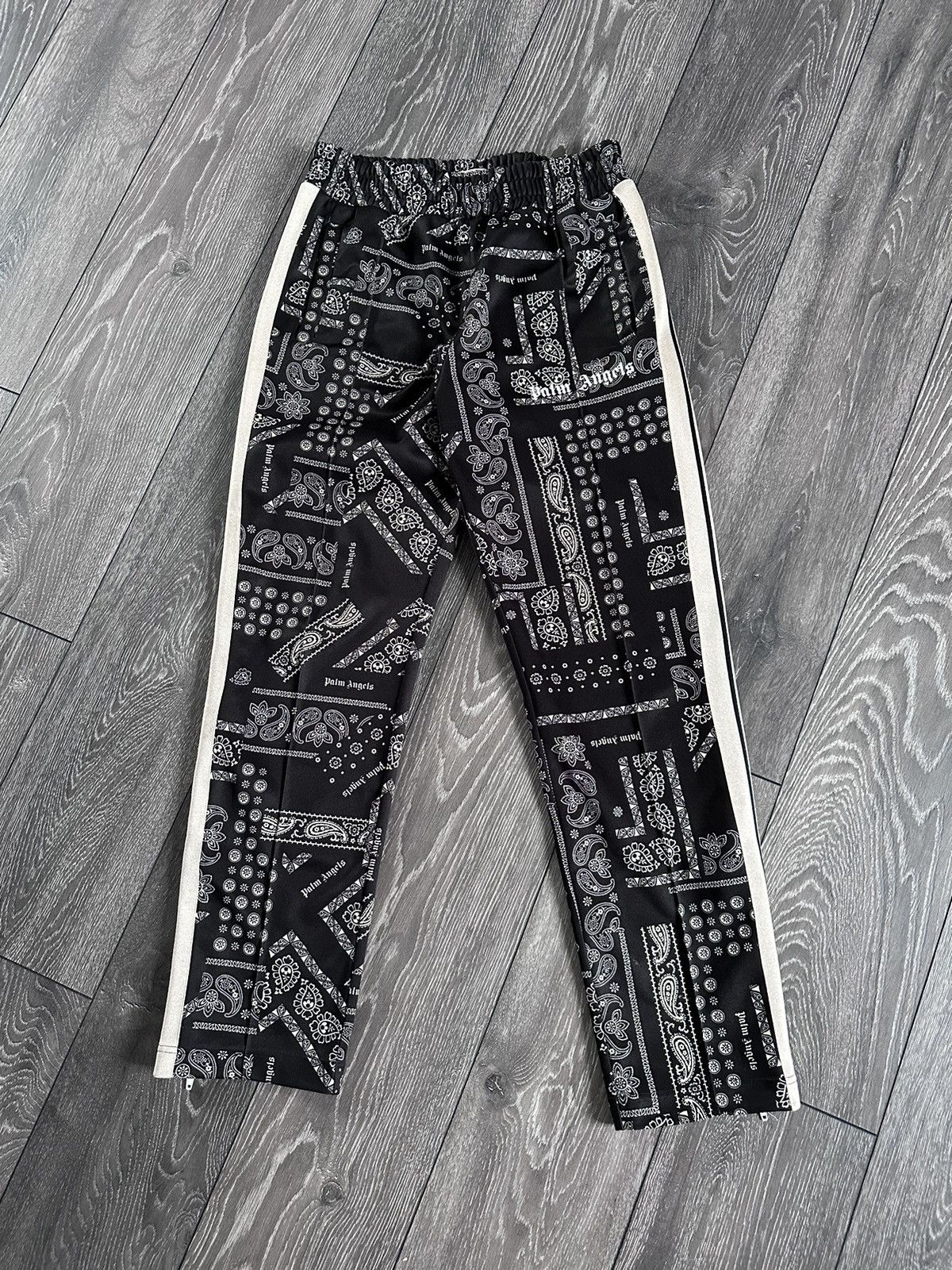 Palm Angels palm angels bandana paisley trackpants black | Grailed