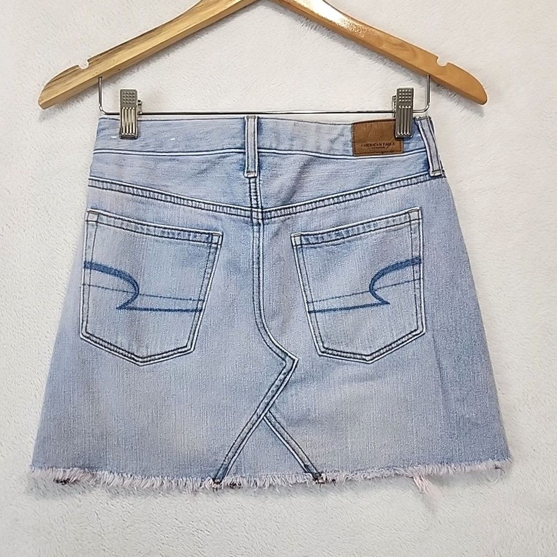 American Eagle Outfitters VINTAGE American Eagle Light Wash Distressed Denim Mini Skirt Womens Size 00 XS Blue Pocket Zip Front Short 90s style Womens Size 24" / US 00 / IT 34 - 7 Thumbnail