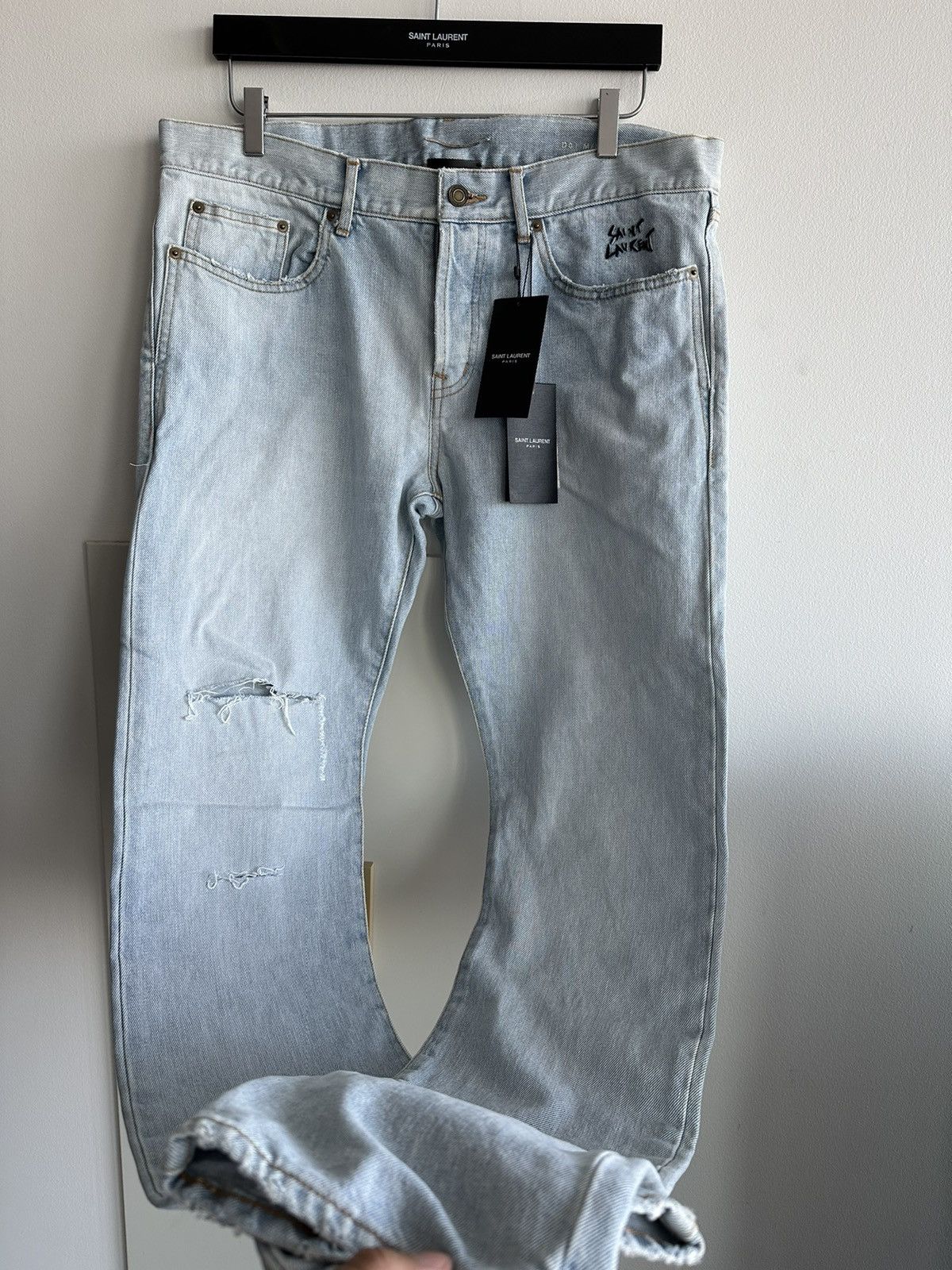 Image of Hedi Slimane x Saint Laurent Paris Slp Super Trashed Ripped Skinny Denim Jeans in Bleu (Size 33)