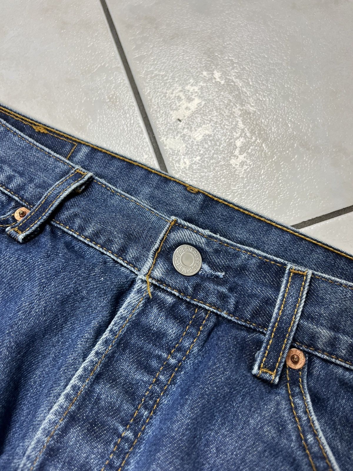 Levi's × Vintage Vintage Levi’s 523 dark washed distressed denim jeans pants Size US 34 / EU 50 - 14 Thumbnail