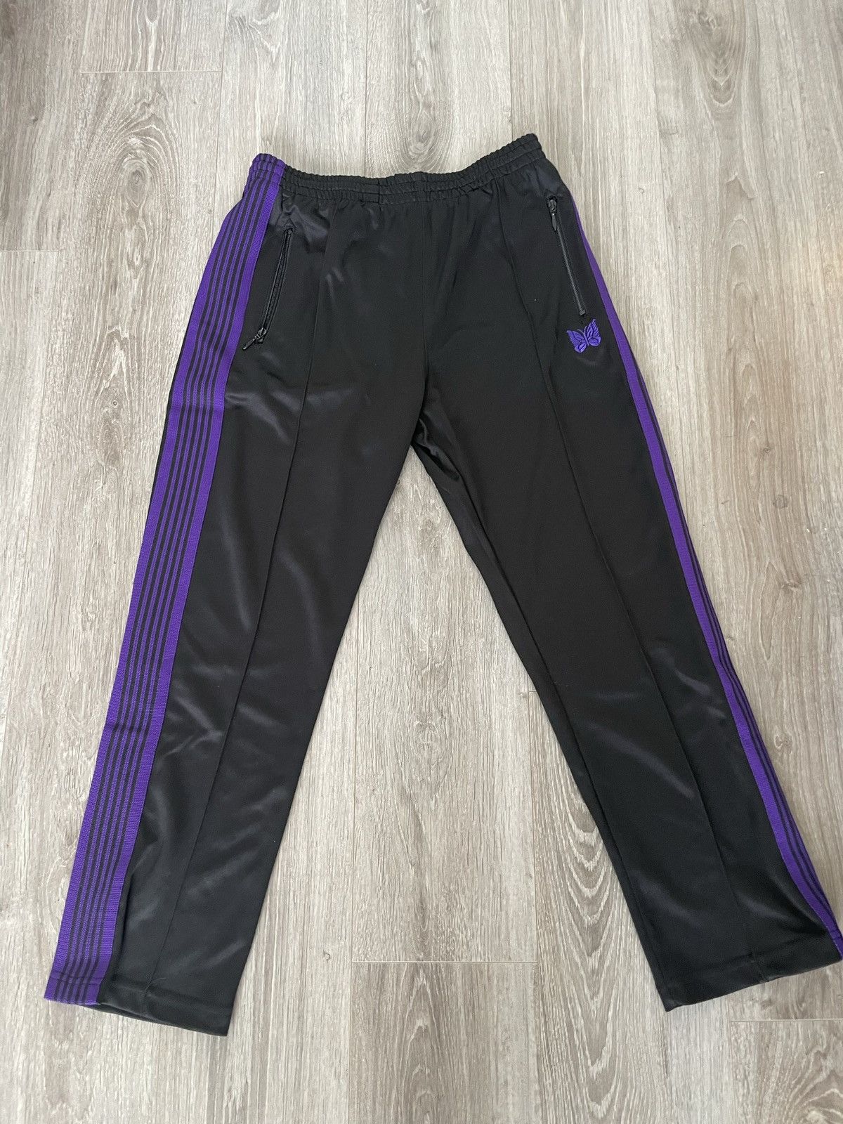司*様 needles Black×Purple Needles × Nepenthes Needles Track Pants | Grailed
