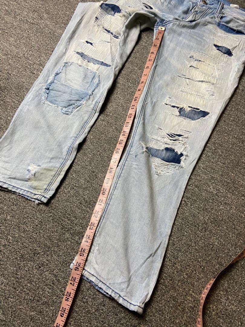 American Eagle Outfitters American Eagle Outfitters Distressed Ripped Jeans (175) Size US 31 - 5 Thumbnail