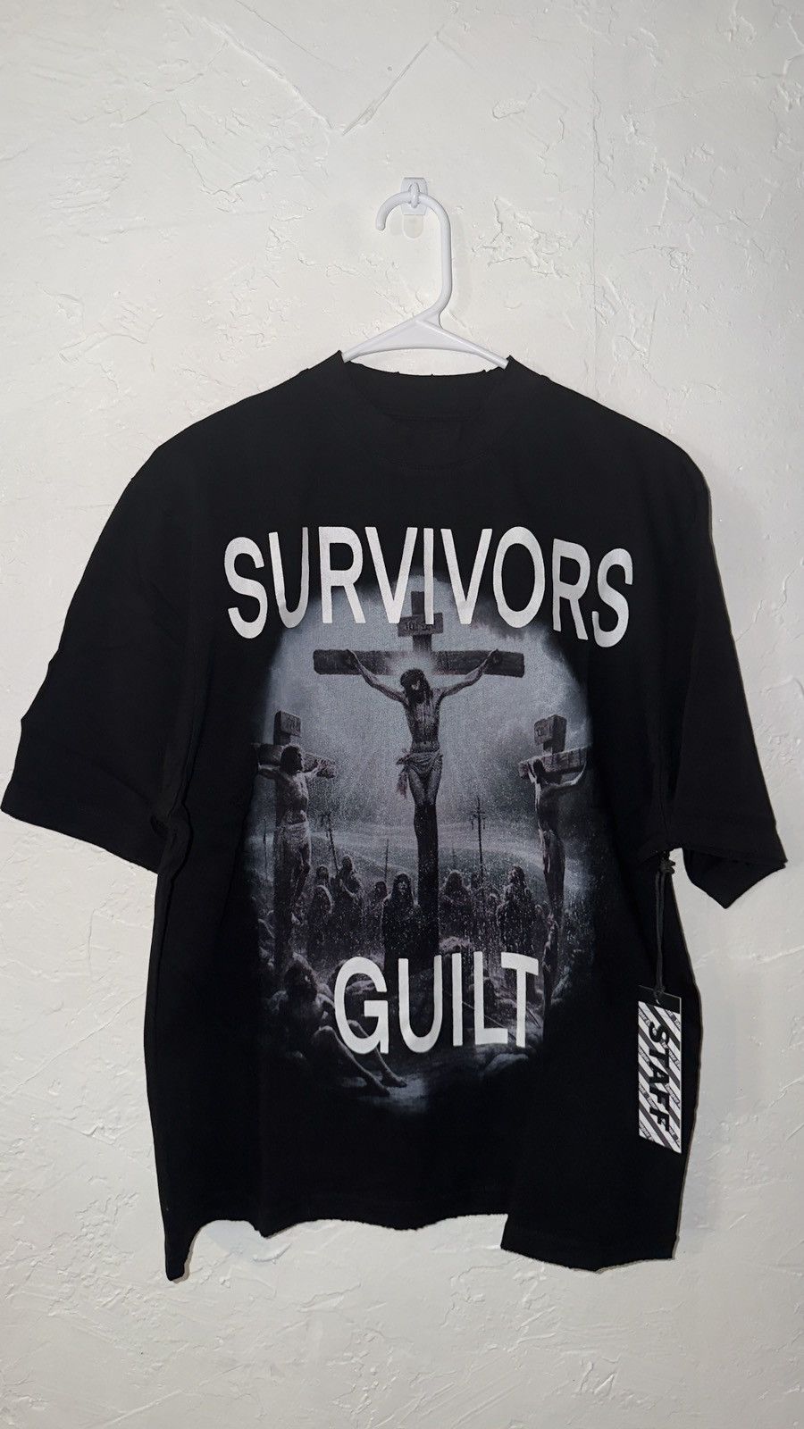 STAFF WORKFORCE STAFFWORKFORCE Survivors Guilt Tee (BLACK) Size US M / EU 48-50 / 2 - 1 Thumbnail