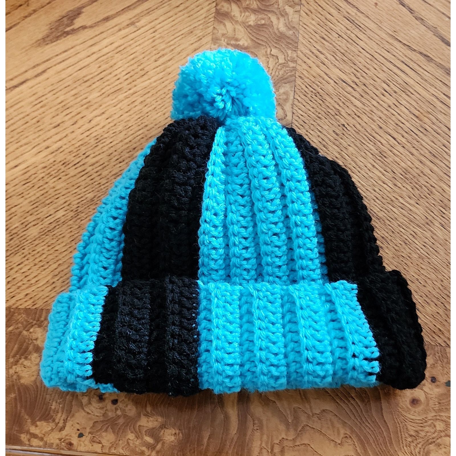 Handmade Handcrafted crocheted blue and black winter beanie. Size ONE SIZE - 1 Thumbnail