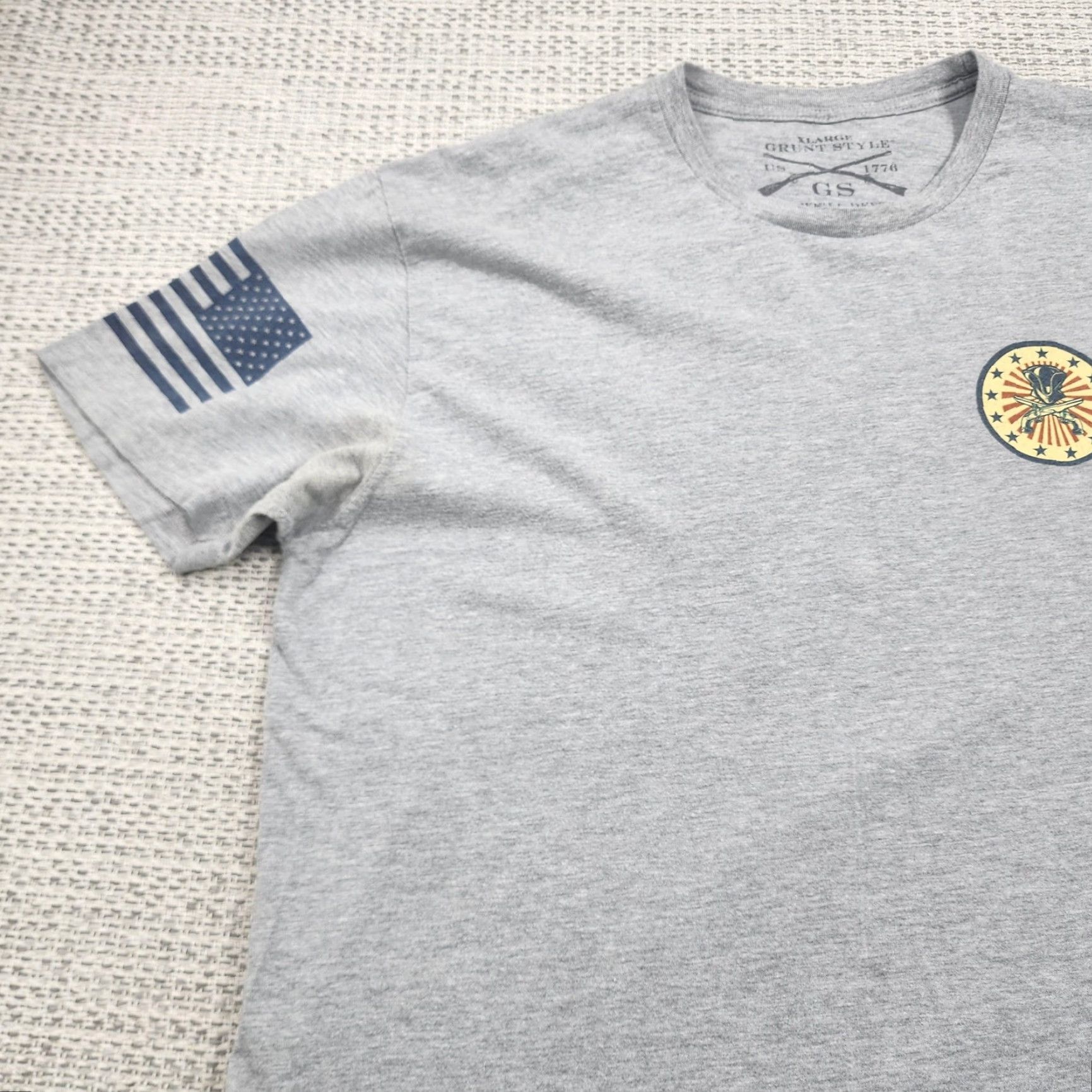 Vintage Grunt Style Shirt Mens Extra Large Gray This We'll Defend American Flag Graphic Shirt? Size US XL / EU 56 / 4 - 5 Thumbnail