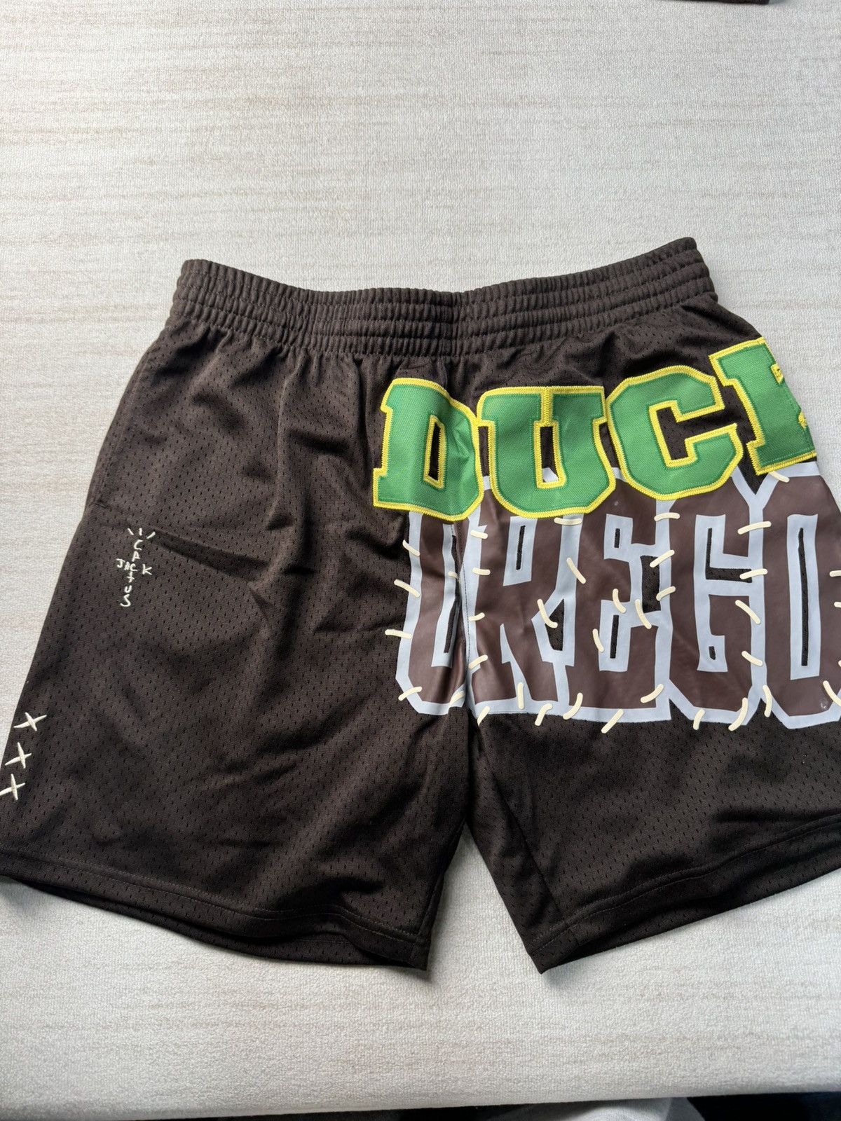 Mitchell & Ness × Travis Scott Oregon ducks basketball shorts Size US 38 / EU 54 - 1 Thumbnail