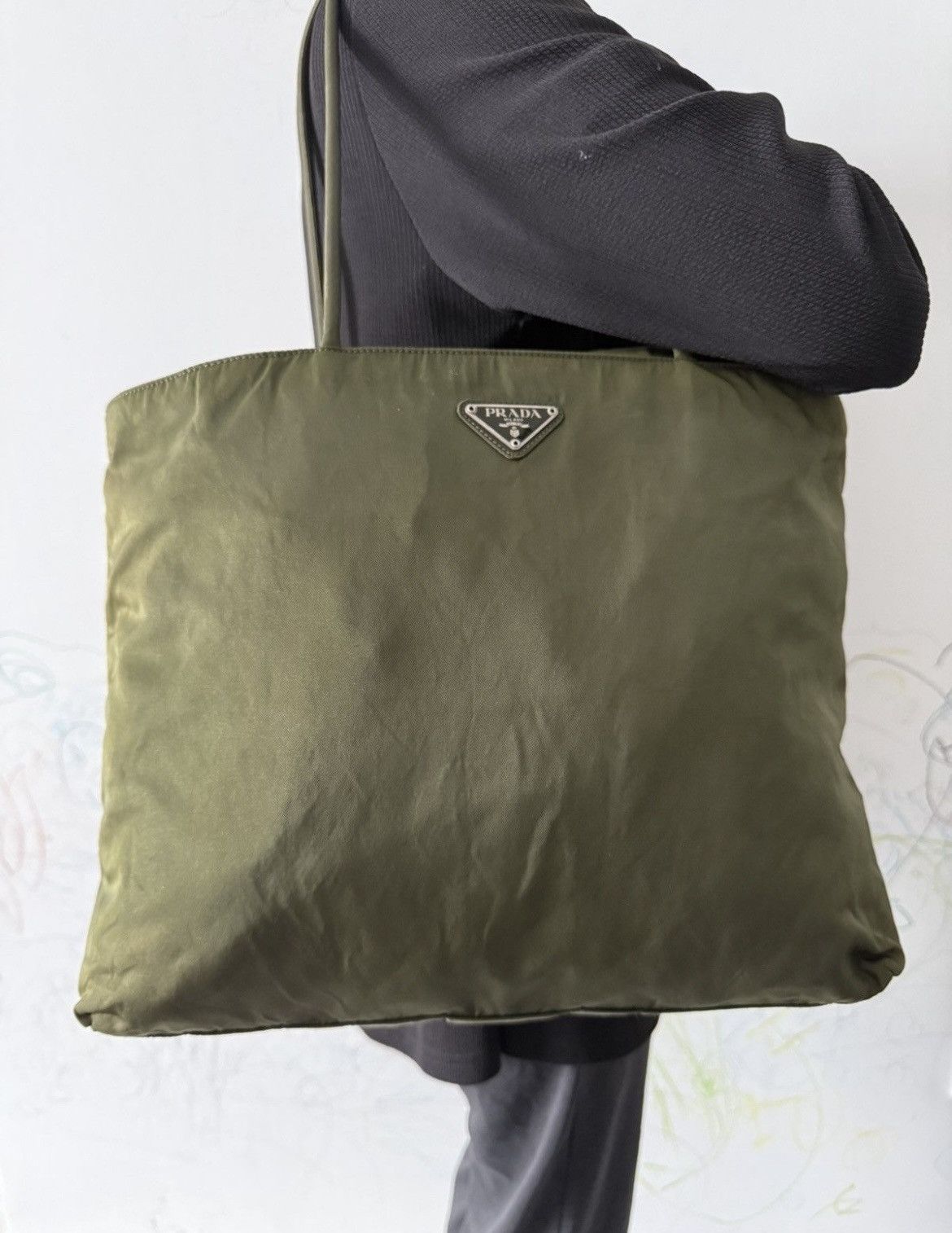 Green Prada luggage bag