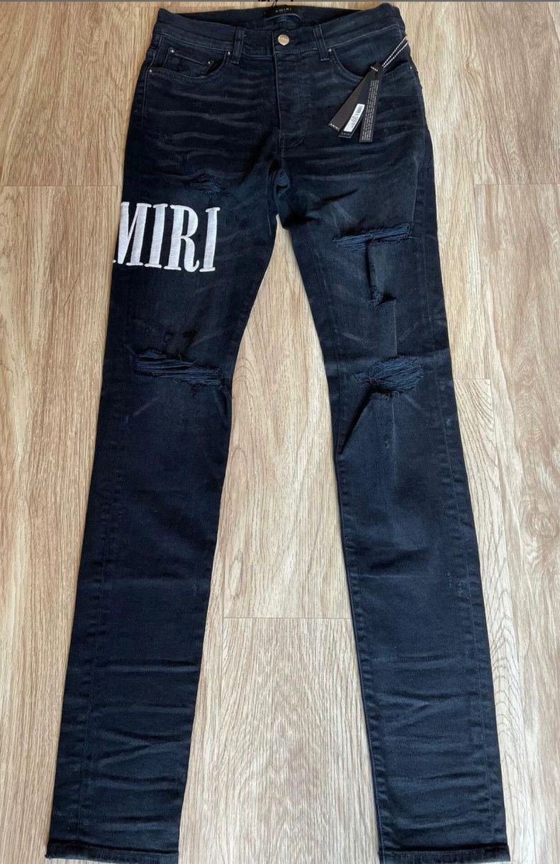 AMIRI Embroidered Distressed Black Jeans - dmc