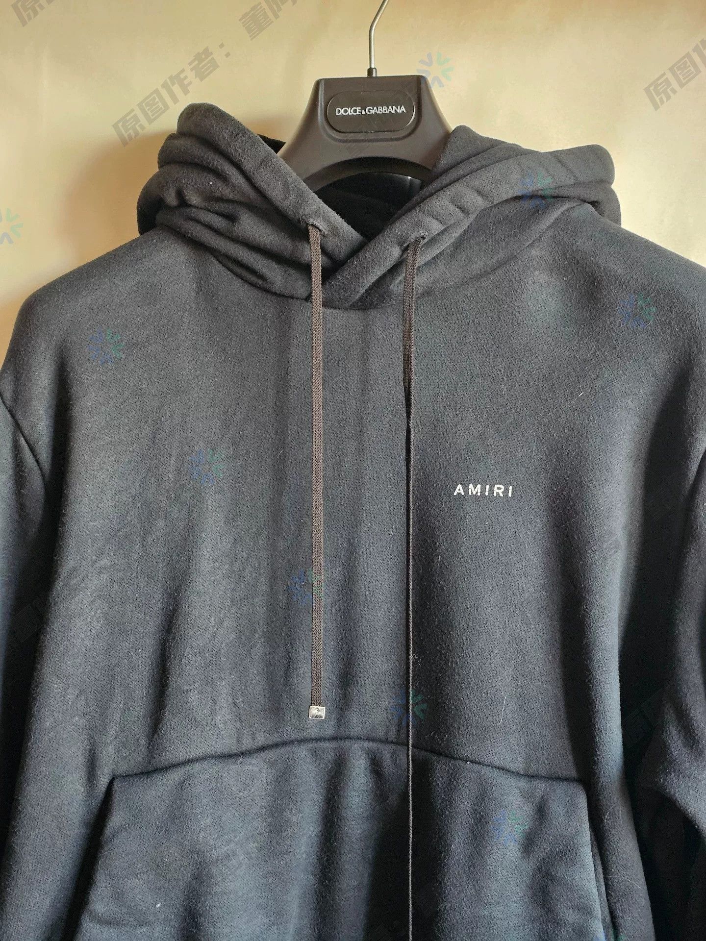 amiri hooded sweatshirt with missing metal tip