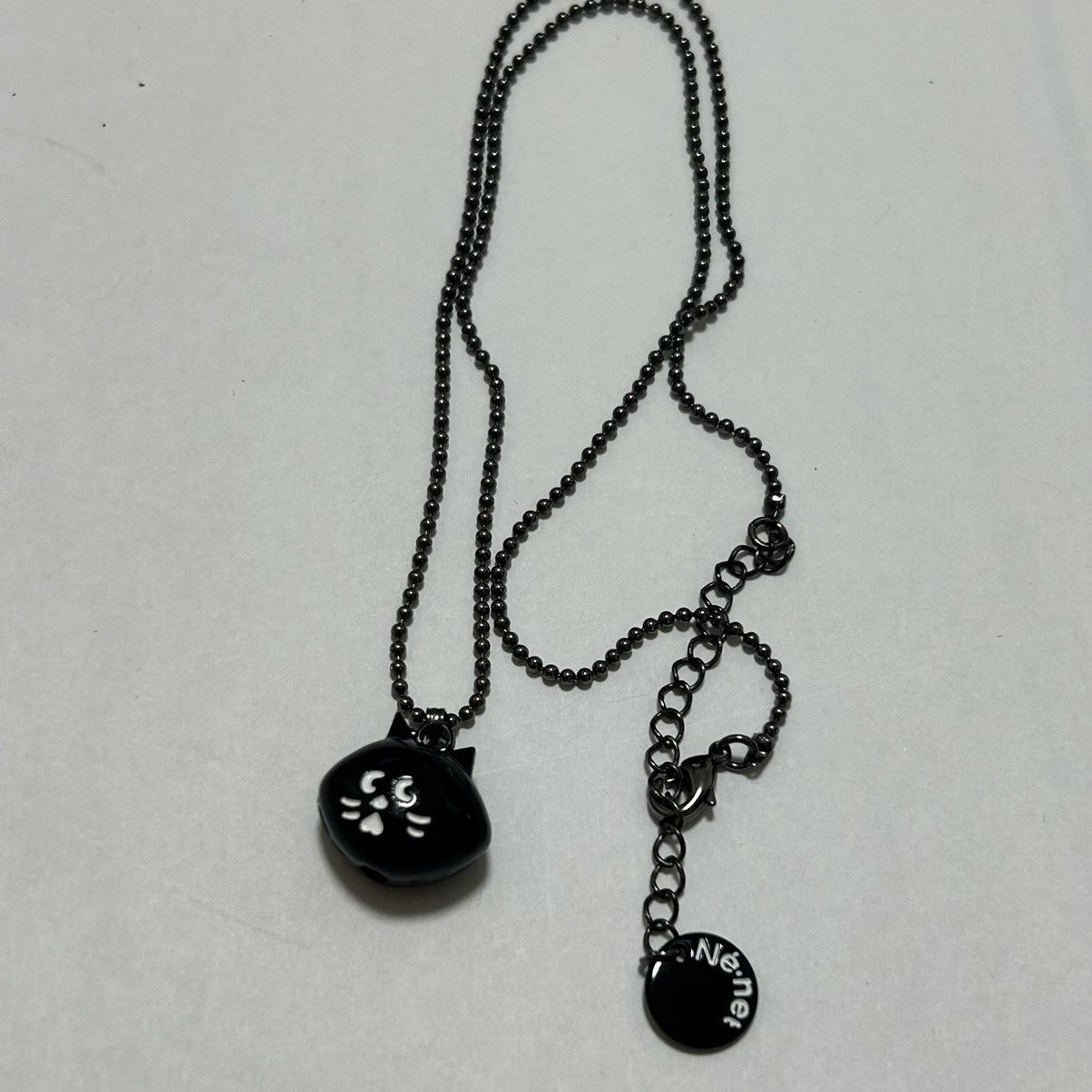 image of Issey Miyake x Ne Net Ne-Net Cat Necklace in Black, Men's