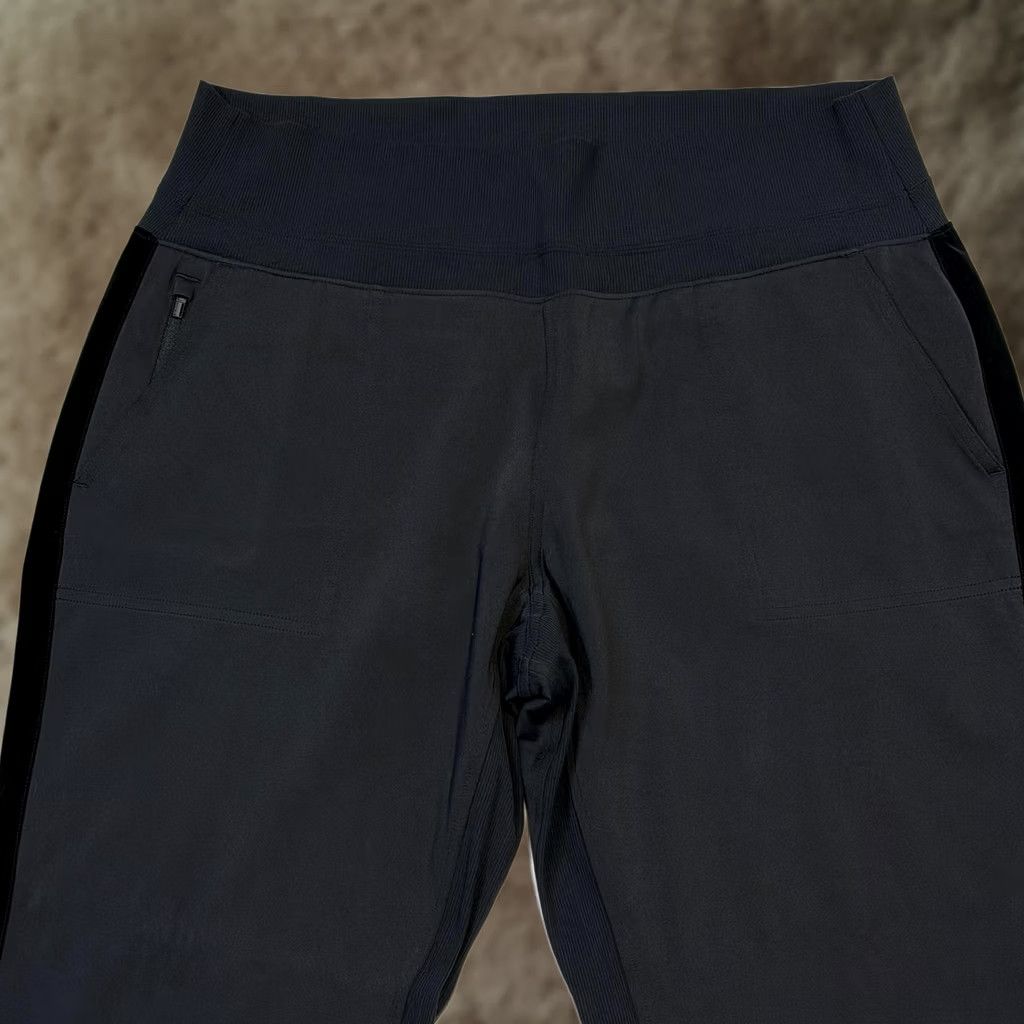 Athleta ATHLETA Women Jogger Black High Rise Rib Waist Pockets Zip Pocket Tapered 27in Inseam XS-XL Activewear Jogger Womens Size 40" / US 18 - 1 Thumbnail