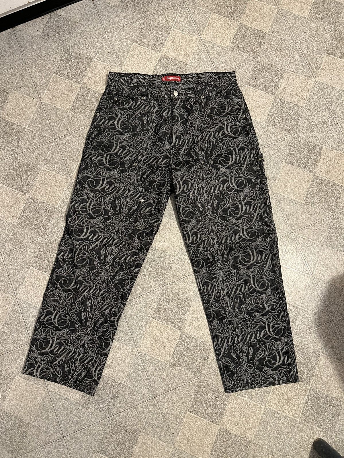 image of Supreme Script Jacquard Double Knee Denim Painter Pants in Black, Men's (Size 34)