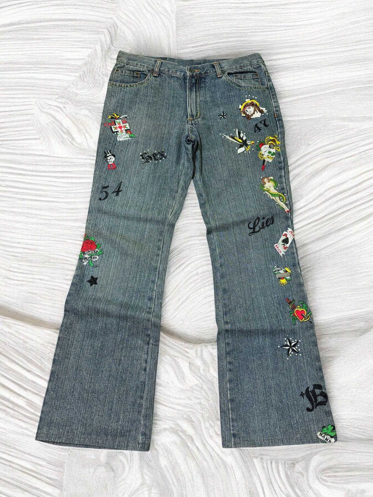 FLARED SEMANTIC DESIGN CROSS EMBROIDERED STYLE DENIM