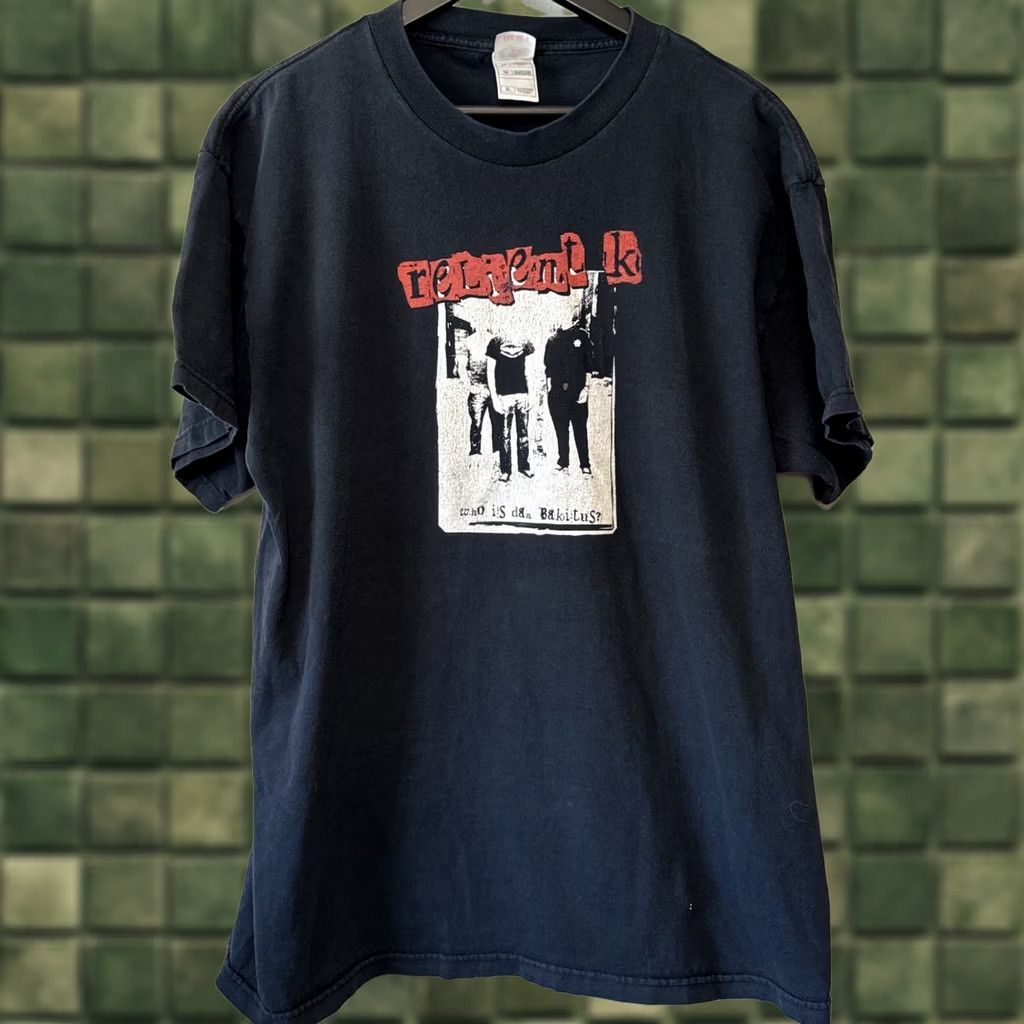Fruit Of The Loom VINTAGE Reliant K Band Tee Shirt Black XL Men Who Is Dan Bakitus? Front Print Graphic Print Cotton Crew Neck Short Sleeve Fruit of the Loom Heavy Size US XL / EU 56 / 4 - 1 Thumbnail