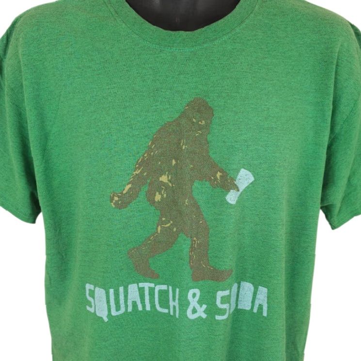 Vintage **Green Mens Large Squatch & Soda T-Shirt Funny Humor** User: **Green Mens Large Squatch & Soda T-Shirt Funny Humor** Size US L / EU 52-54 / 3 - 2 Thumbnail